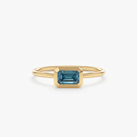 Solid Gold Octagon Blue Topaz Ring