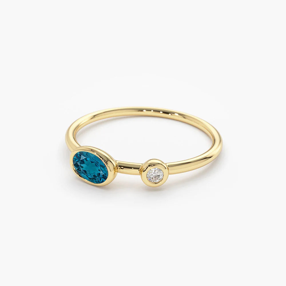 Solid Gold Oval London Blue Topaz and Diamond Ring
