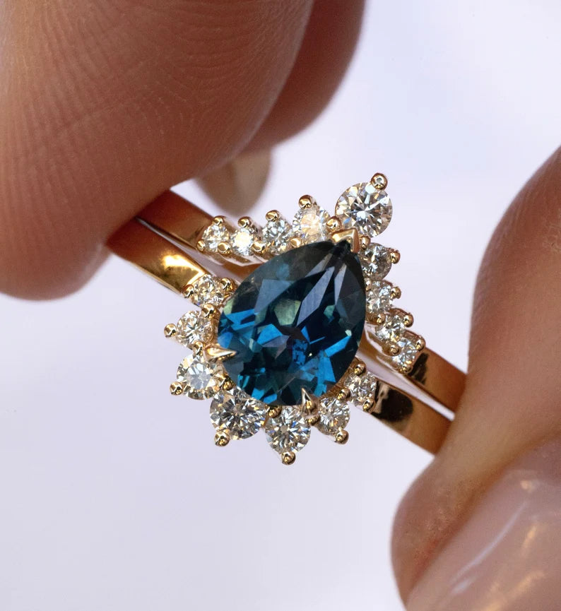 Solid Gold Pear Teal Montana Sapphire Sunburst Halo Ring