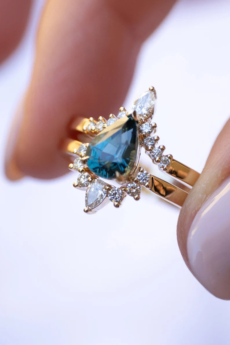 Solid Gold Teal Sapphire Engagement Ring With Diamonds