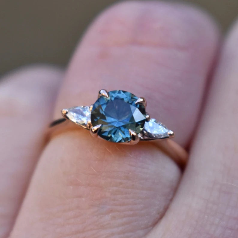 Solid Gold Teal Blue Montana Sapphire Ring With Diamonds