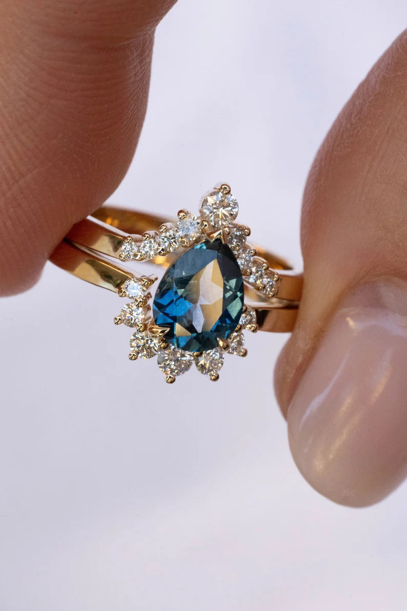 Solid Gold Pear Teal Montana Sapphire Sunburst Halo Ring