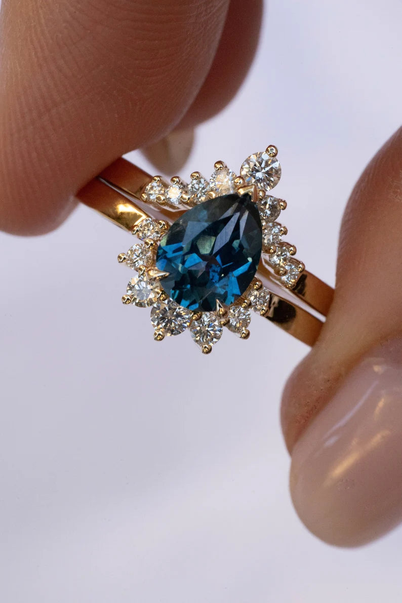 Solid Gold Pear Teal Montana Sapphire Sunburst Halo Ring