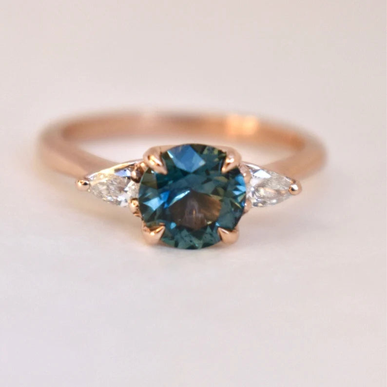 Solid Gold Teal Blue Montana Sapphire Ring With Diamonds