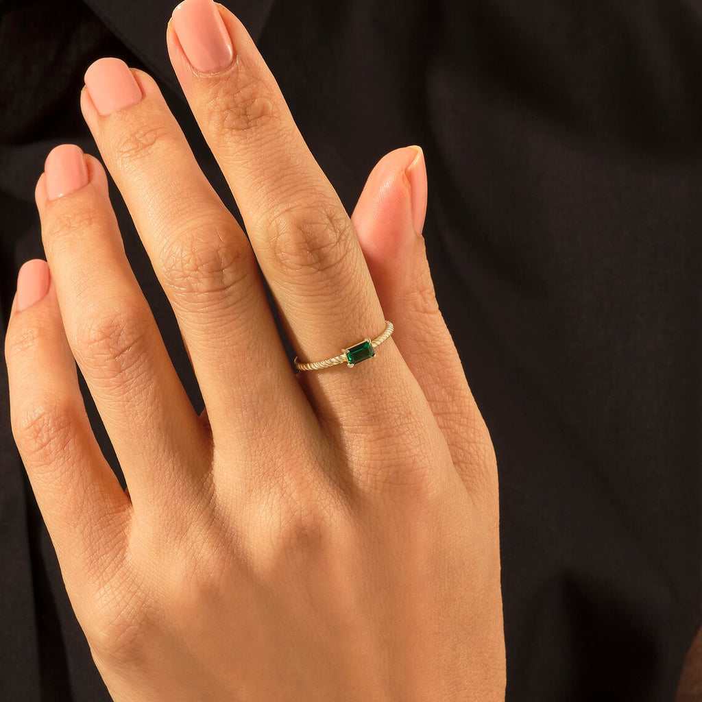 Solid Gold Baguette Emerald Twist Ring