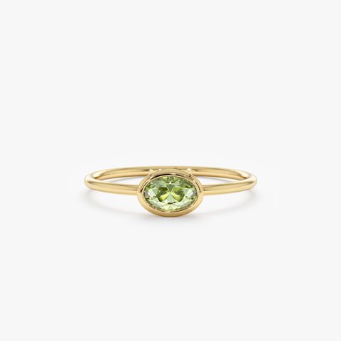 Oval Peridot Ring In Solid Gold