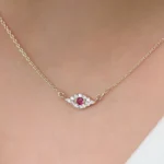 14K Solid Gold Diamond and Ruby Evil Eye Necklace - Image 3